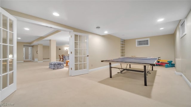 game room with light carpet and french doors