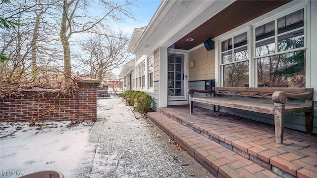 view of snow covered patio