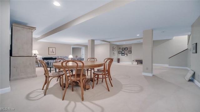 dining room featuring recessed lighting, baseboards, and light colored carpet