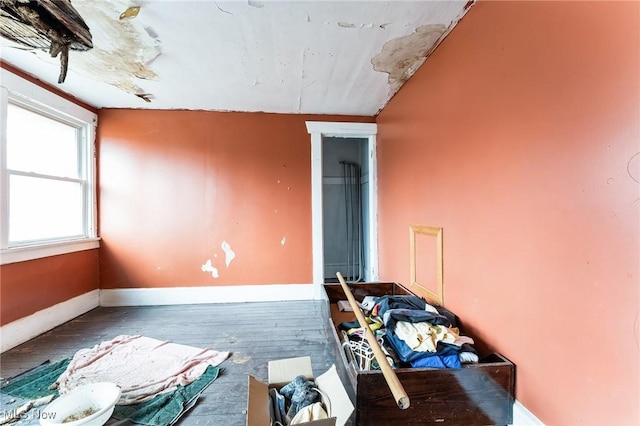 spare room with dark wood-type flooring