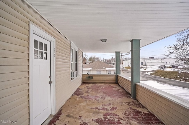 view of snow covered patio