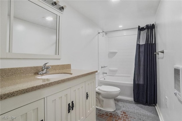 full bathroom with toilet, vanity, and shower / bath combo with shower curtain