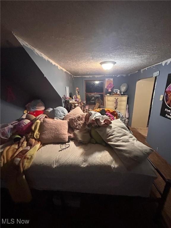 bedroom with a textured ceiling