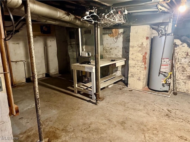 basement featuring gas water heater