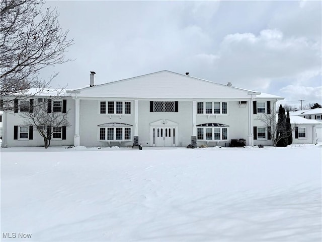 view of snow covered property