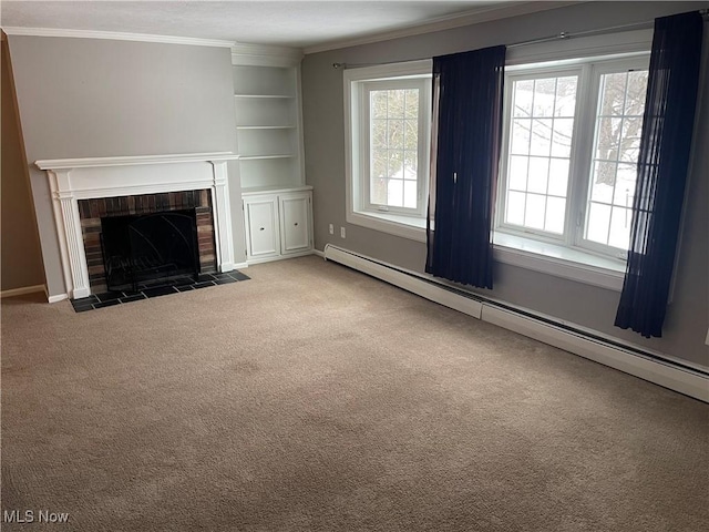 unfurnished living room with a baseboard heating unit, built in features, ornamental molding, carpet flooring, and a brick fireplace