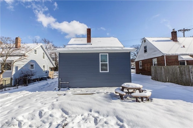 view of snow covered property