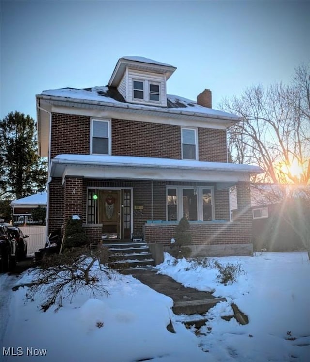 view of front of home featuring covered porch