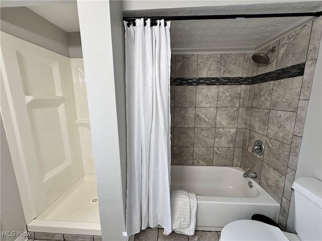 bathroom featuring toilet and tile patterned flooring