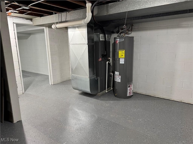 basement featuring electric water heater and heating unit