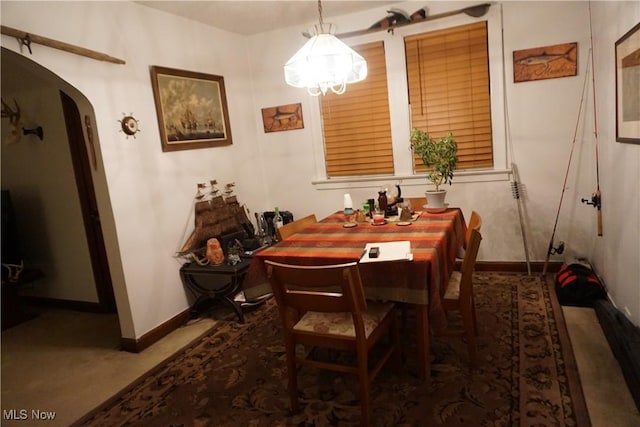 dining area featuring carpet floors