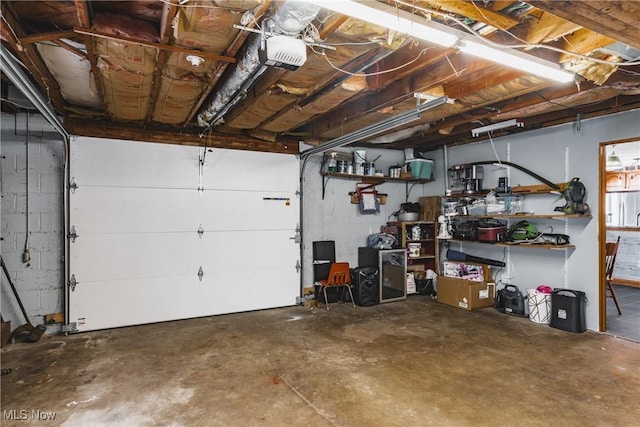 garage featuring a garage door opener