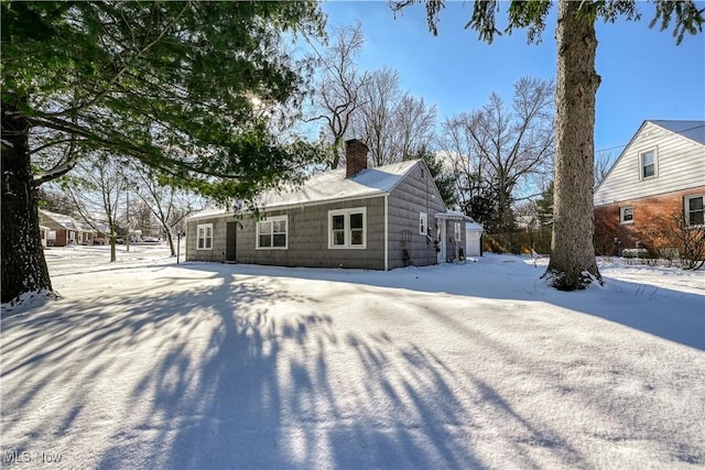 view of snow covered property