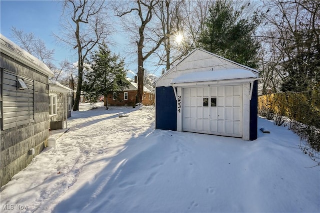 view of snow covered garage