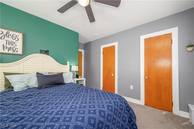 bedroom with ceiling fan and carpet floors