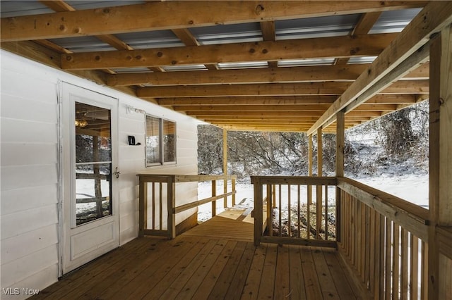 view of snow covered deck