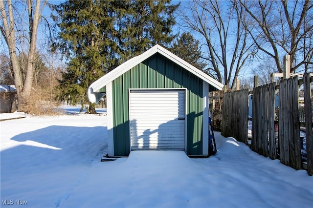 view of snow covered garage