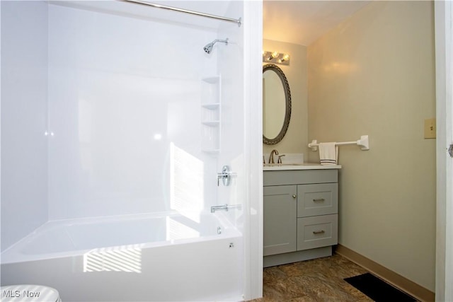 bathroom with shower / tub combination and vanity