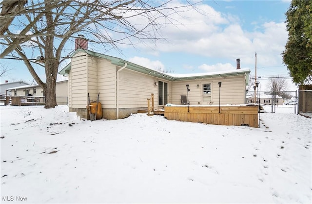 view of snow covered property