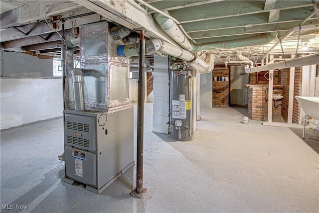 basement with sink, heating unit, and gas water heater