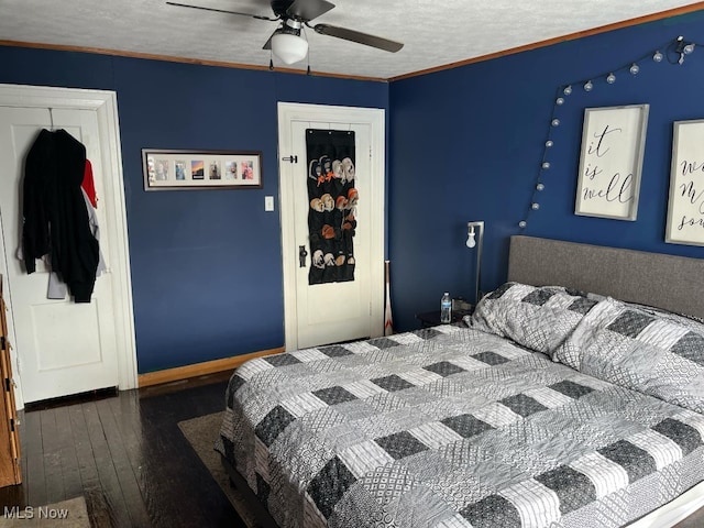 bedroom with a textured ceiling, dark hardwood / wood-style flooring, a closet, ornamental molding, and ceiling fan