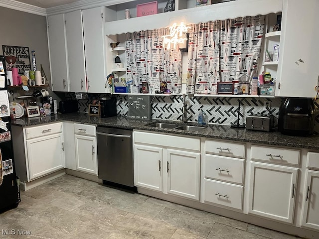 kitchen featuring dishwasher, sink, ornamental molding, white cabinets, and dark stone counters