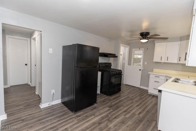 kitchen with white cabinetry, sink, dark hardwood / wood-style flooring, and black appliances