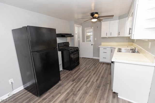 kitchen with white cabinetry, wood-type flooring, sink, and black appliances