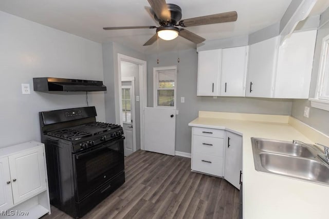 kitchen with sink, white cabinetry, dark hardwood / wood-style flooring, ceiling fan, and black gas range