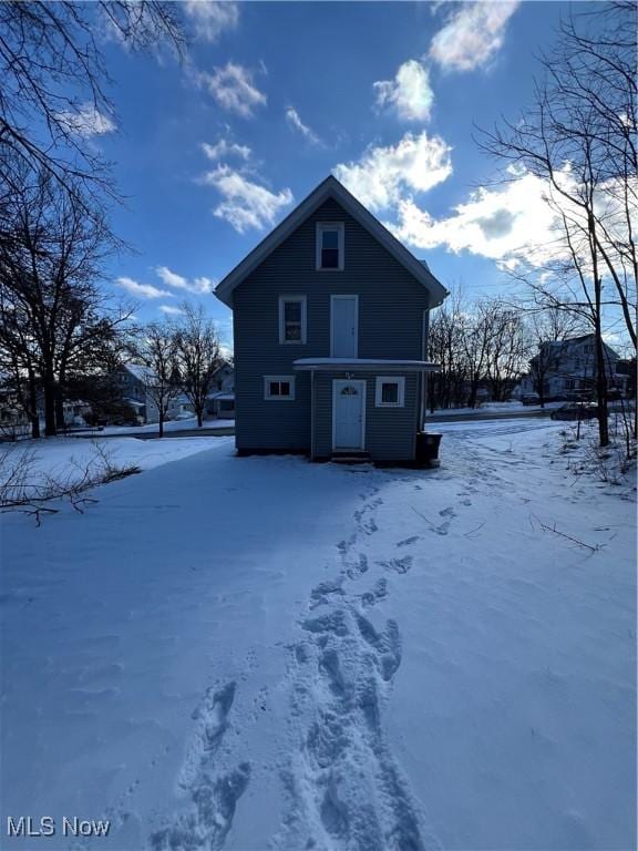 view of snow covered property