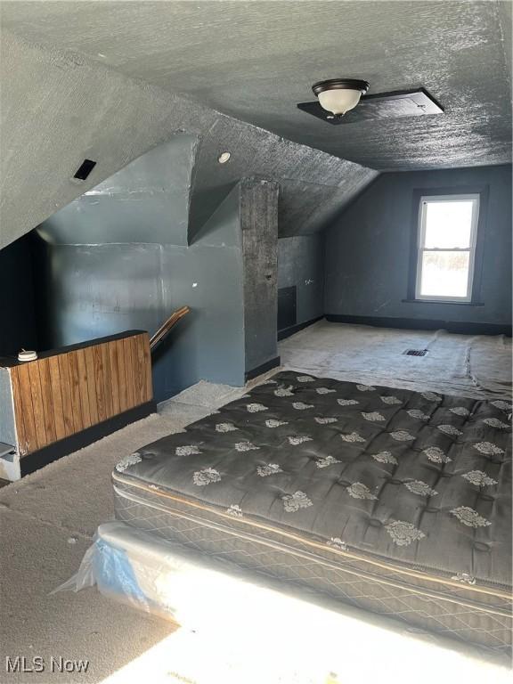 bonus room with lofted ceiling