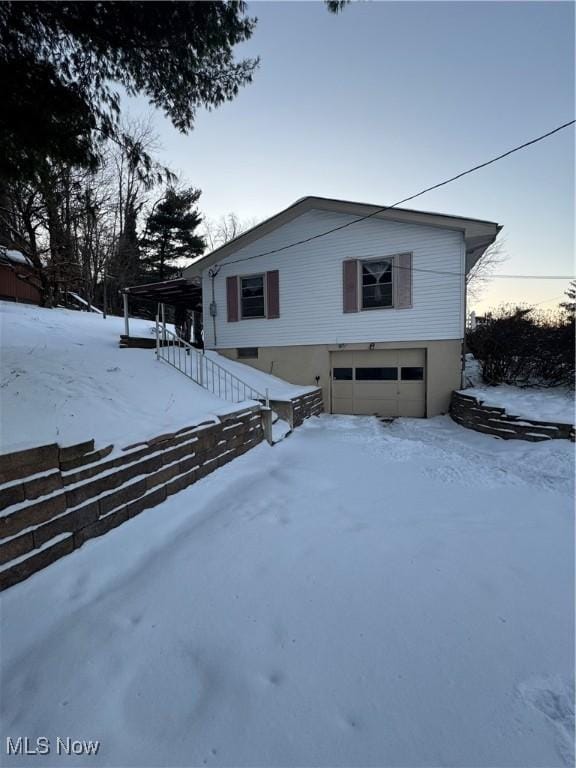 exterior space with a garage