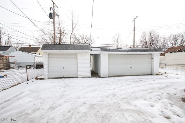 view of snow covered garage