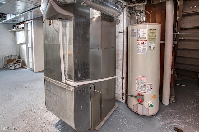 utility room featuring heating unit and gas water heater