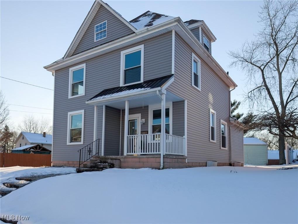 front of property featuring covered porch