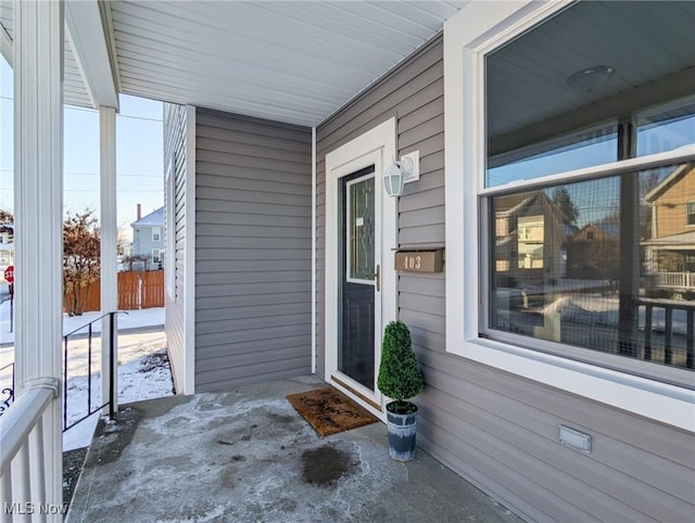 doorway to property featuring a porch