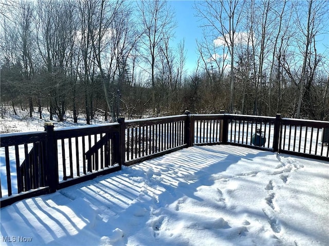 view of snow covered deck