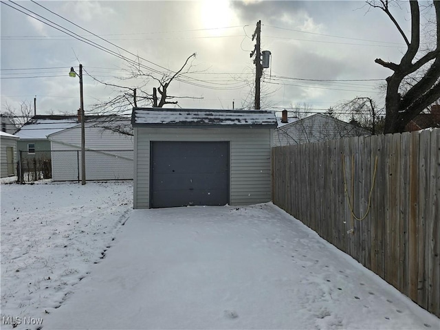 view of snow covered garage