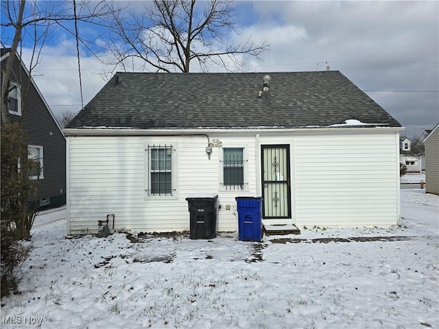 view of snow covered property