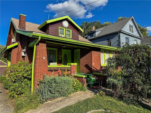 view of front of property featuring covered porch