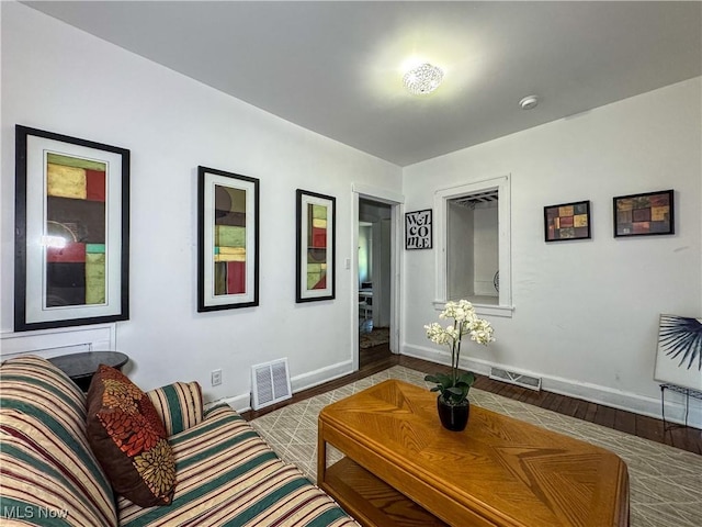 living room with wood-type flooring