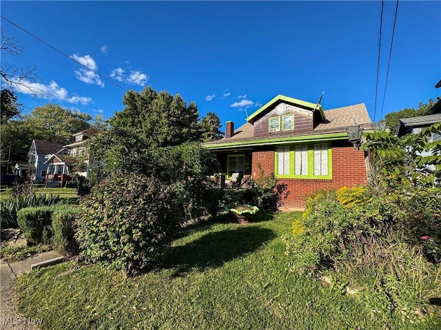 view of property exterior featuring a yard