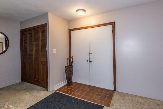 entryway featuring carpet flooring