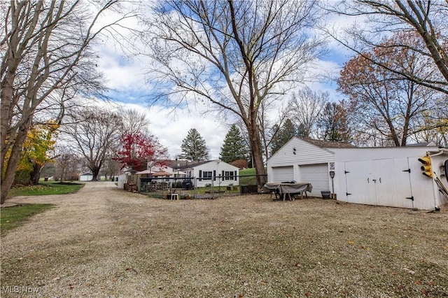 view of yard with a garage