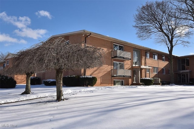 view of snow covered property