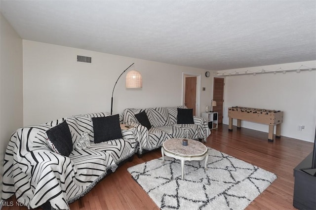 living room featuring hardwood / wood-style flooring