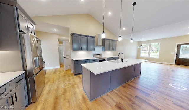 13430 Schreiber Rd, Valley View, OH 44125 - kitchen featuring light countertops, a sink, light wood-style floors, and stainless steel appliances