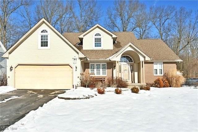 view of front of property with a garage