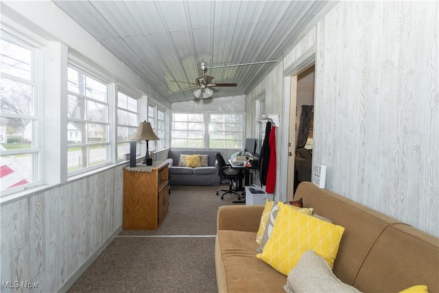 sunroom / solarium with ceiling fan