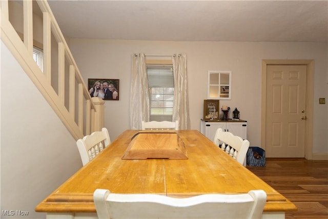 dining area with wood-type flooring